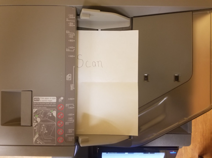 Load your document into the scanning tray.